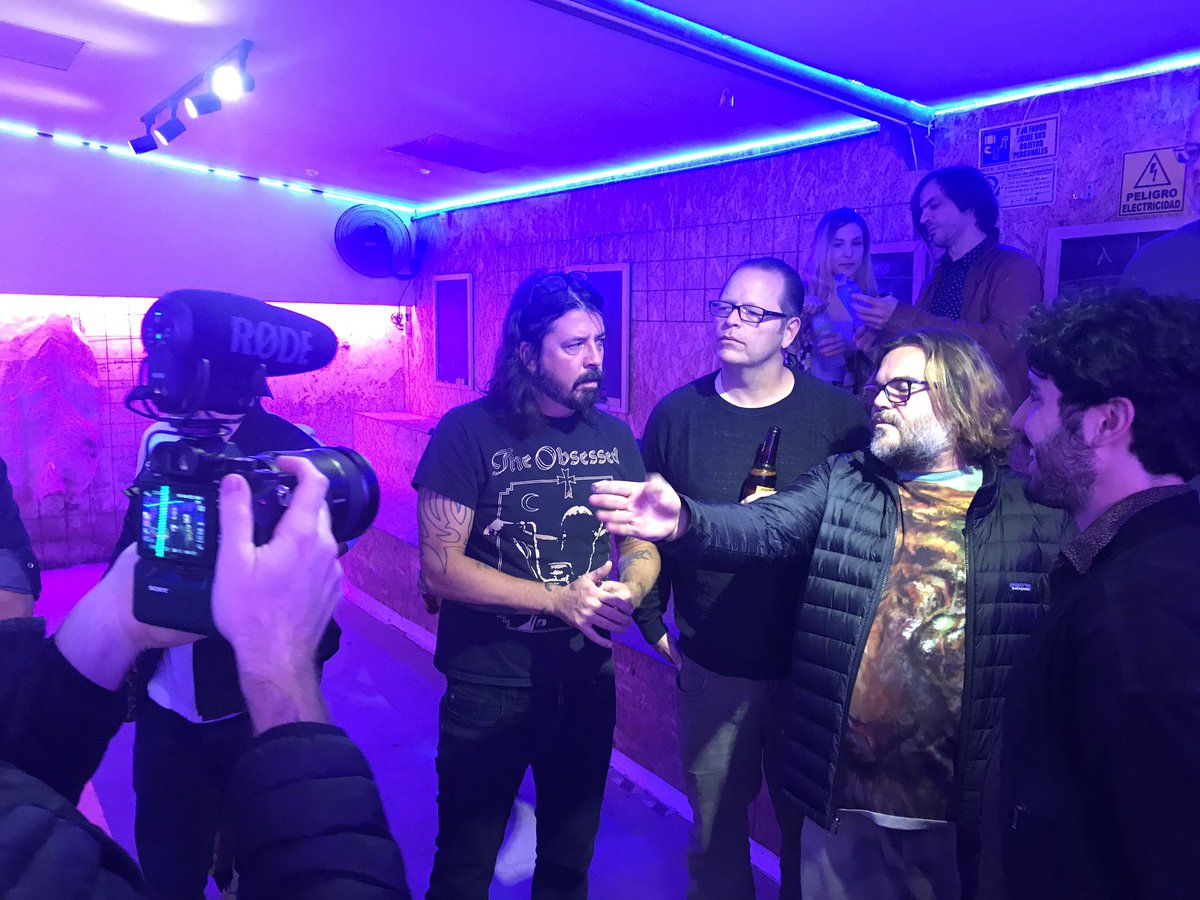 Weezer's tweet image. The 3 deadliest Tejo teams in the world were locked in fierce competition tonight in Bogota, Colombia. @foofighters  @tenaciousd and weezer each won 1, &amp;amp; the tiebreaker went to the Foos. Everyone lost significant amounts of hearing. Tomorrow we rock your face off! #karlscorner