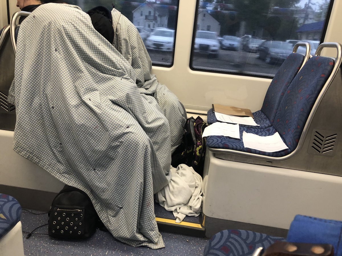 metrotransients's tweet image. Homeless tent camp during rush hour. Sleeping here all night? Green Line, 7:52AM, westbound. @MetroTransitMN #greenline #metrotransitmn #stpaul #minneapolis #cleanupthegreenline