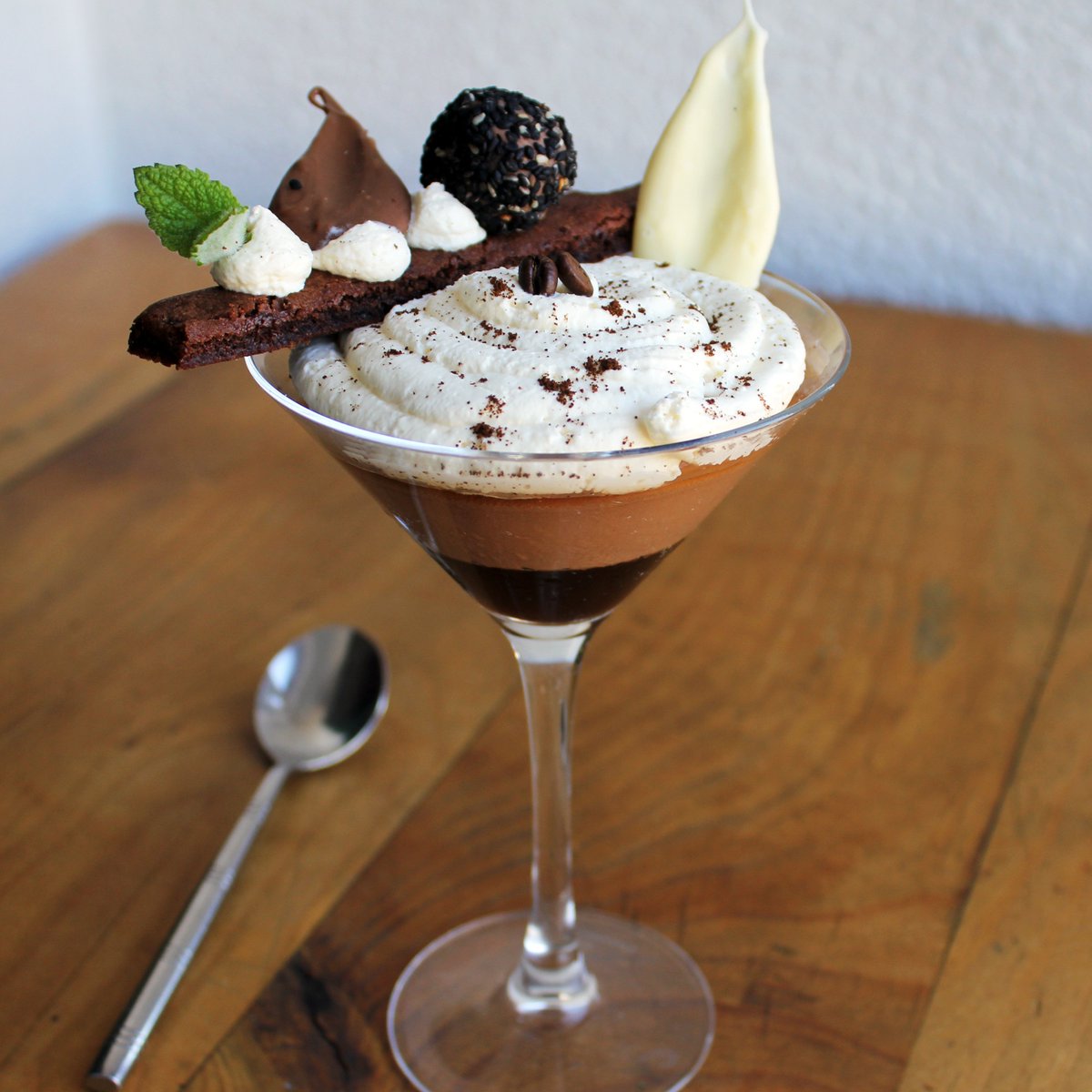 Let's celebrate #WorldCoffeeDay with this new dessert on the menu! This is our Espresso Martini Chocolate Mousse, Toasted Sesame, and Olive Oil Truffle. It's creamy, smooth, and so rich in flavour!