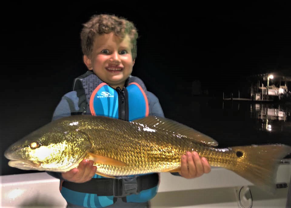RETWEET if you support kids that fish; like Finn here with another sick Red, I hear he's been slaying them ALL WEEK!
