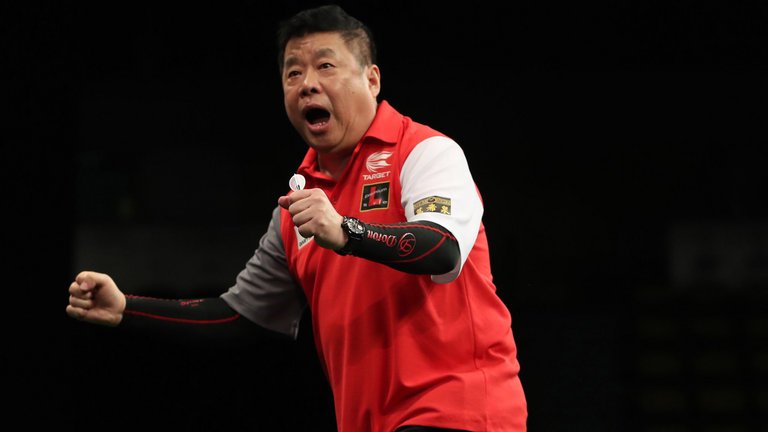 DartsMatchApp's tweet photo. #DartsFact - At the age of 65, Paul Lim played in the 2019 PDC World Cup of Darts for Singapore, making him the oldest player to ever compete for their country in a televised darts event. https://t.co/sbr0Q9IkBj