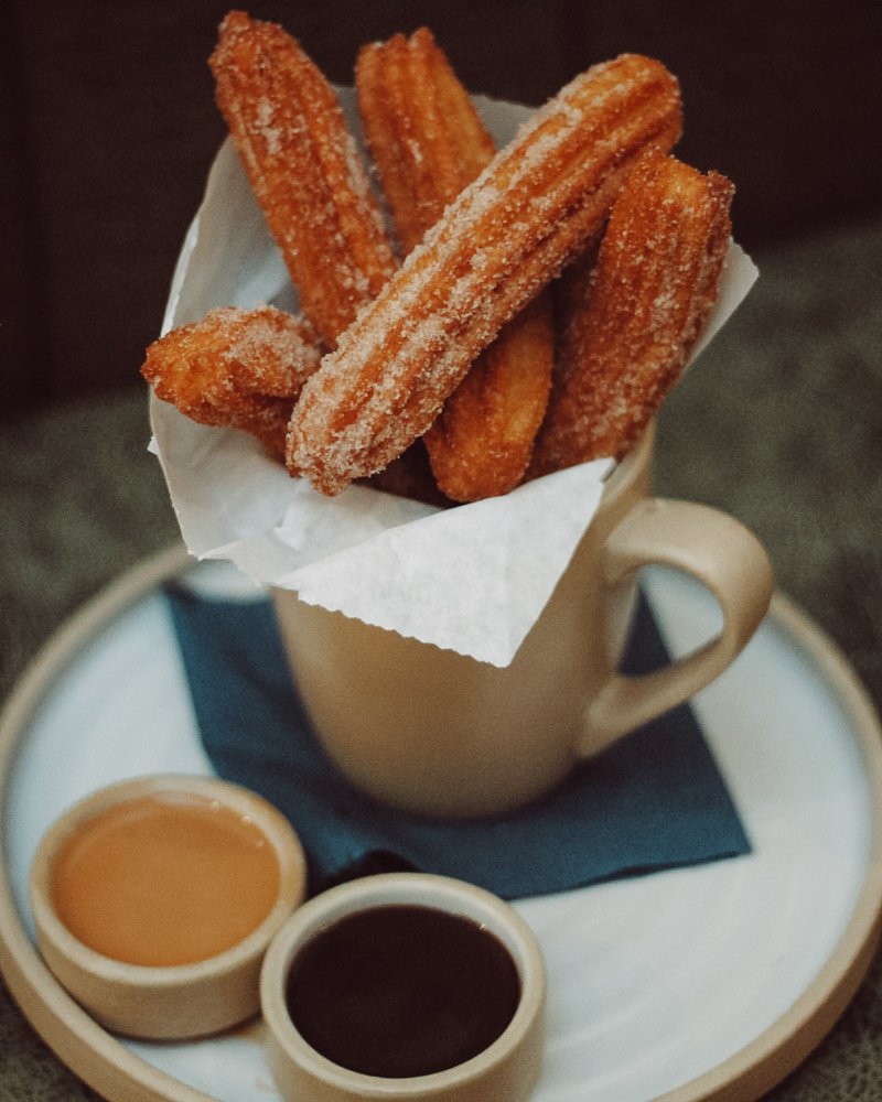 Happy National Dessert Day -- Drop an anchor at #NavyProofLB and try their delicious churros in celebration! #nationaldessertday