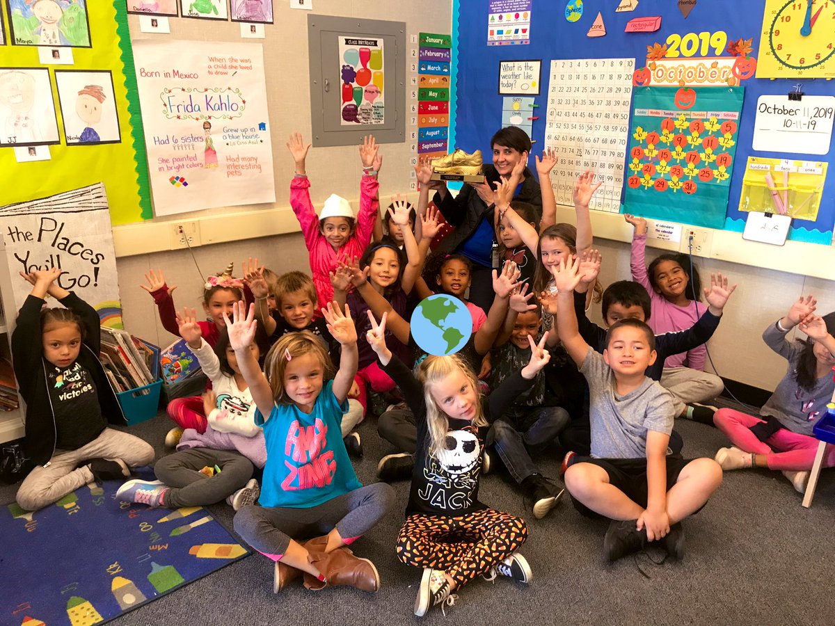 HolbrookMDUSD's tweet photo. Principal @MargaMarshall awards the “Golden Sneaker Award” to Ms. @CosettiMelissa  1st TWDI class for the higher participation during #walktoschoolday 2019!! @StSmartsDiablo https://t.co/5Jk1j67rgG