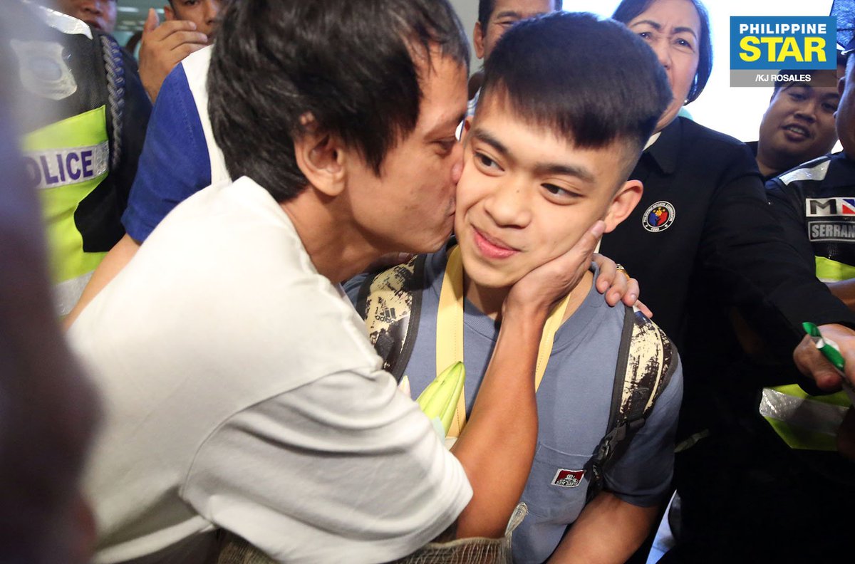 PhilippineStar's tweet image. Olympic gymnast Carlos Edriel Yulo, Philippines' first world champion in gymnastics, was greeted by his family upon his arrival at the NAIA Terminal 3 on Tuesday.