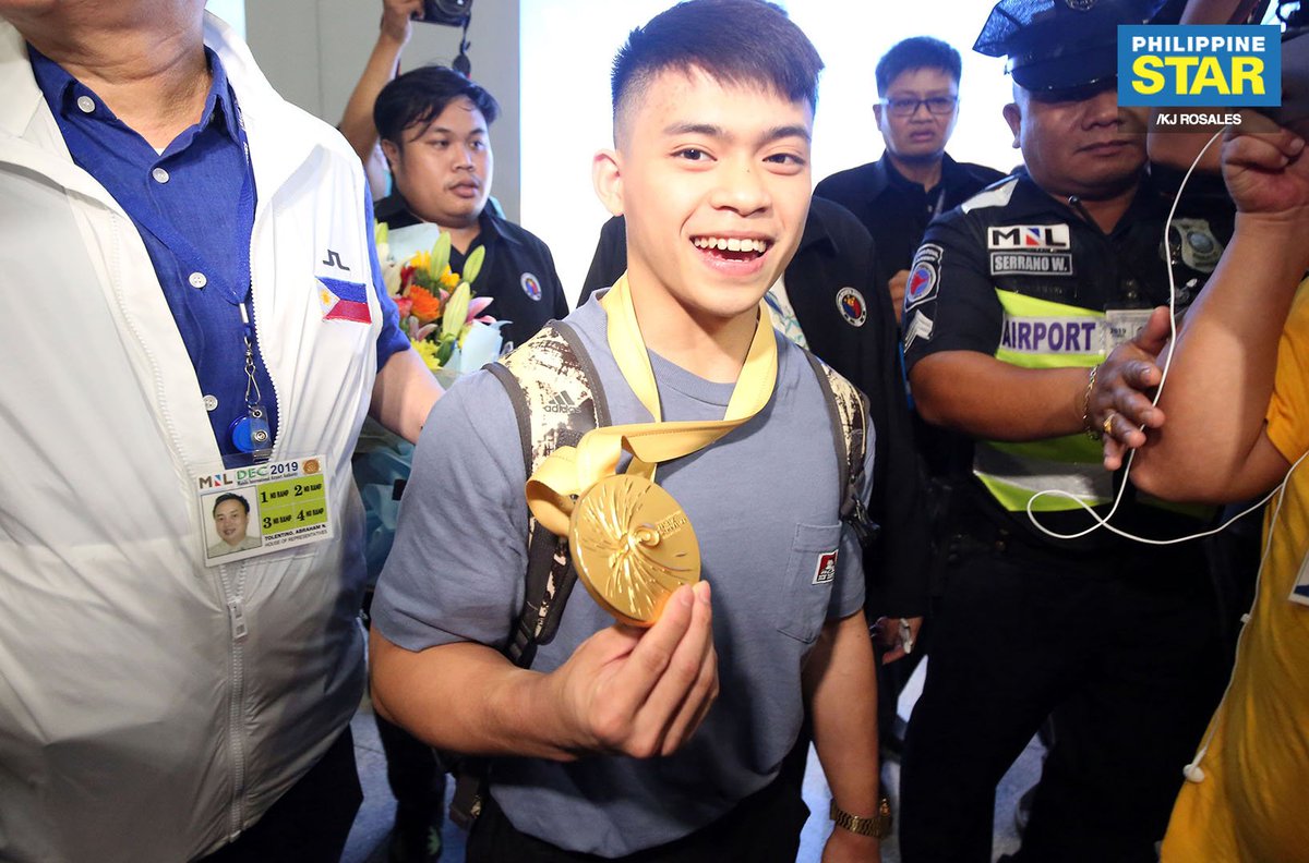 PhilippineStar's tweet image. Olympic gymnast Carlos Edriel Yulo, Philippines' first world champion in gymnastics, was greeted by his family upon his arrival at the NAIA Terminal 3 on Tuesday.