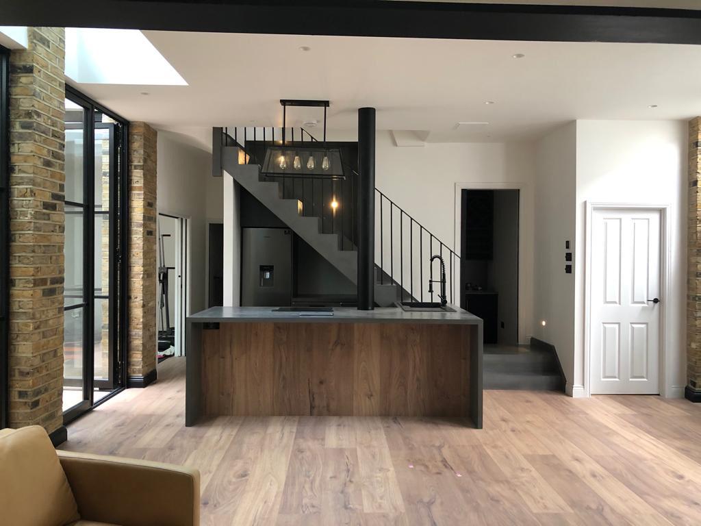 dRAWarchitects's tweet image. The first shots of our latest newly finished project in Clapham. The statement concrete staircase and kitchen island give an industrial feel to the room alongside the large crittall doors and exposed brickwork. #dRAWArchitecture #ConcreteStaircase #Industrial #Crittall #Kitchen