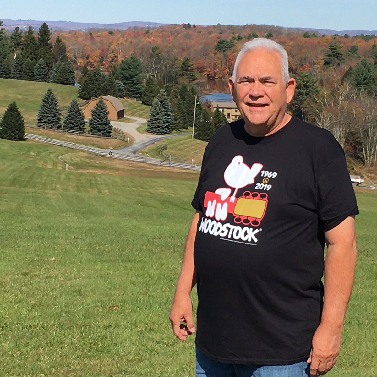 RickXUser1's tweet photo. Ok , the big reveal everyone:  Here I am. Standing on the field of the actual 1969 #Woodstock festival in Bethel, NY. #meansalottome https://t.co/zhez6hxLnS