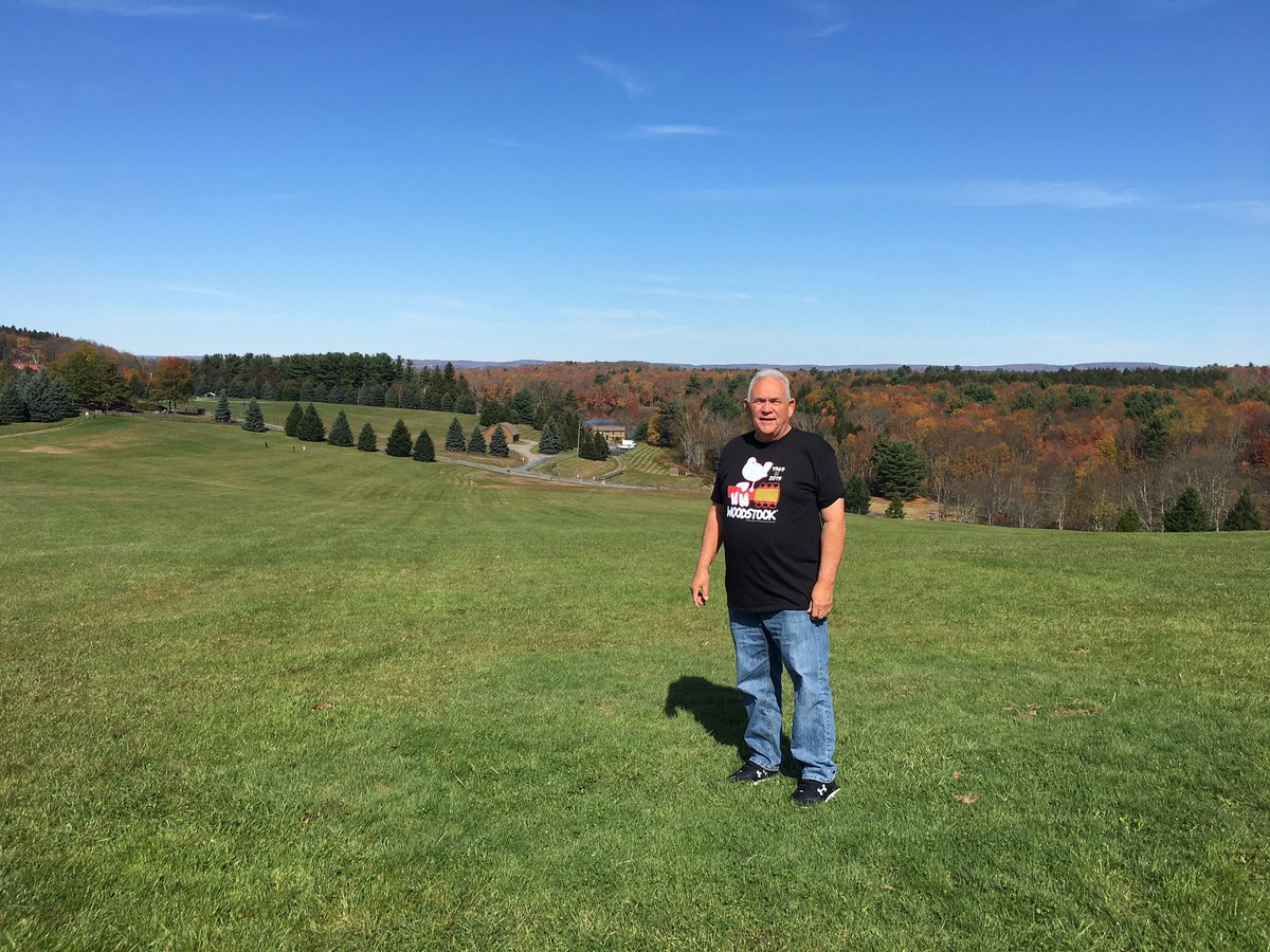 RickXUser1's tweet photo. Ok , the big reveal everyone:  Here I am. Standing on the field of the actual 1969 #Woodstock festival in Bethel, NY. #meansalottome https://t.co/zhez6hxLnS