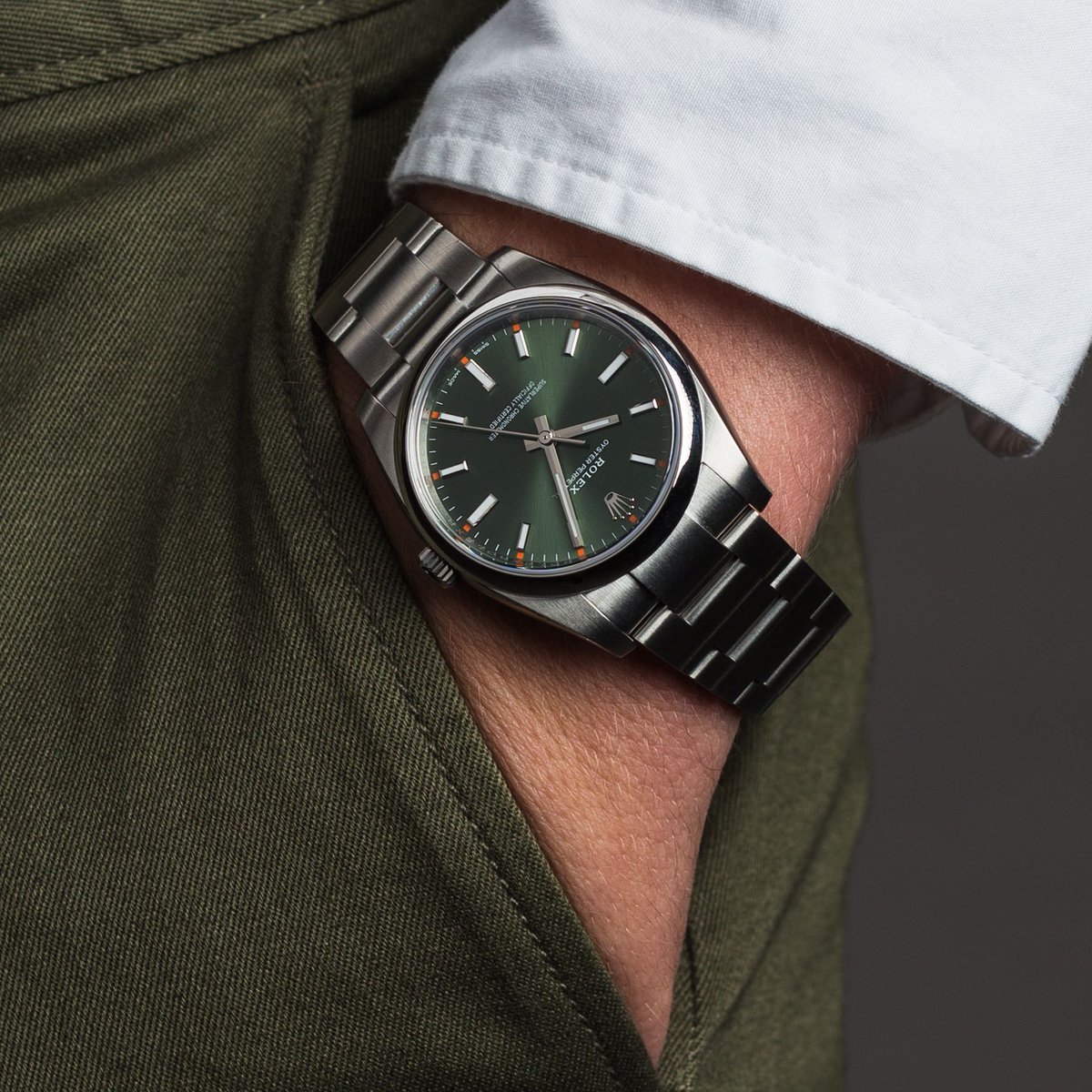 WatchBox Global on Twitter: "The Rolex Oyster Perpetual (114200) is beauty with its olive stainless steel case and stainless steel bracelet. What do you think about this 34mm