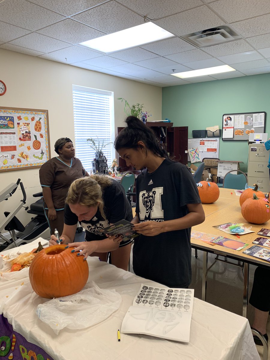 Out in the community at Carlyle Place helping decorate and carve pumpkins 🎃 #RoarTogether