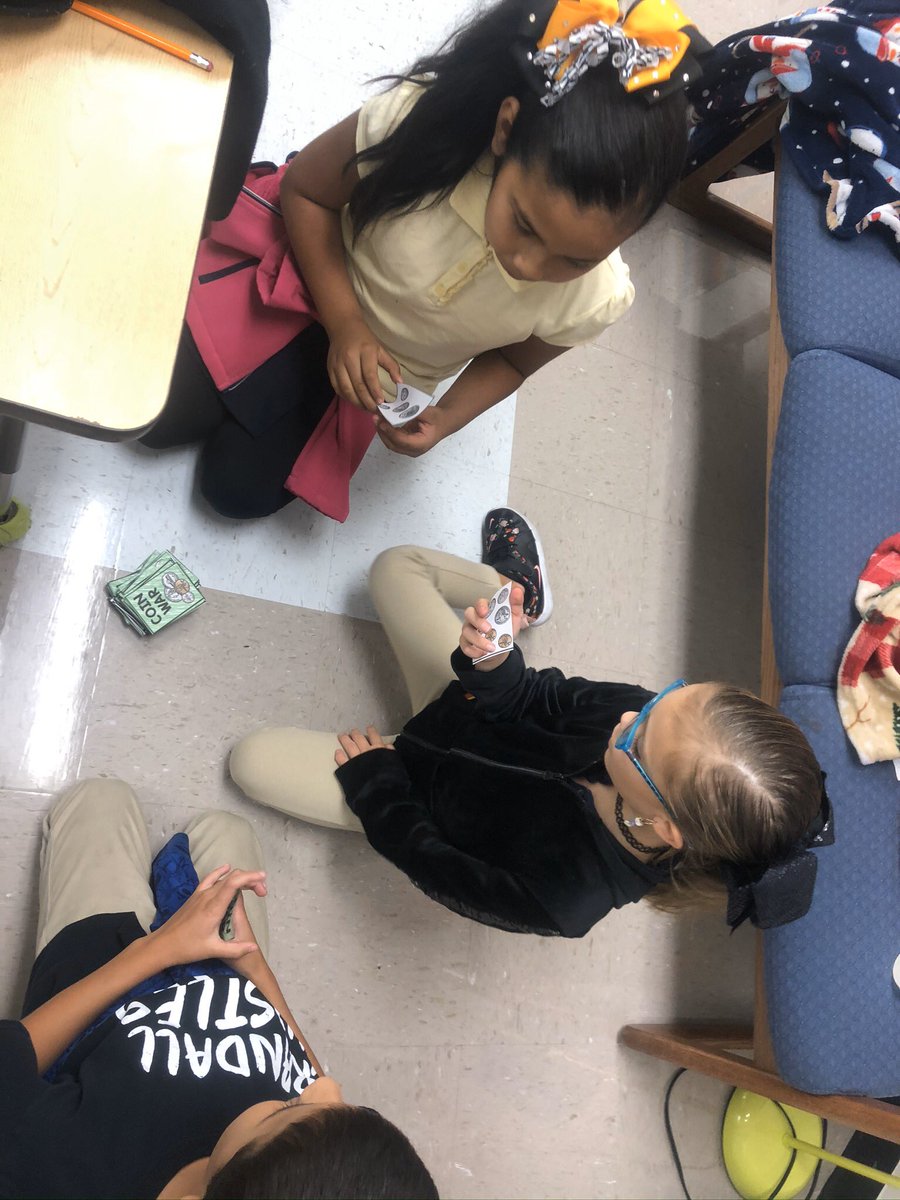 MsVitovsky's tweet photo. They had some much fun playing coin war last week! This really motivated them to find out how much they had on their card because they wanted to win of course! 🤑🤑 #countingcoins #identifyingthevalue #totalvalue @CISDMartin https://t.co/Jx66GmL2AY