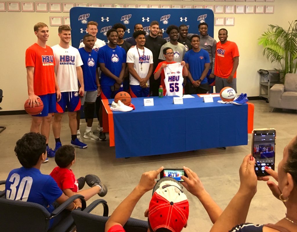 FoJFoundation's tweet photo. Reily is adopted by @HBUBasketball! He signed a certificate, received gear & show off his basketball skills. He's ready to cheer on his teammates this season & beyond! Thank you for opening your team to Reily & #FriendsofJaclyn,@HBUBasketball! Welcome to the FOJ Family! #FOJPride https://t.co/rPmeUOrrsJ