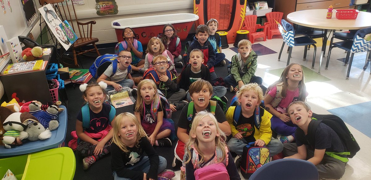 mrs_anderton's tweet photo. Our class got BOOED today!! A bag loaded with fall goodies. We opened up the fangs...we love them! #beenbooed #glowinthedarkfangs https://t.co/eFLRGEpUeu