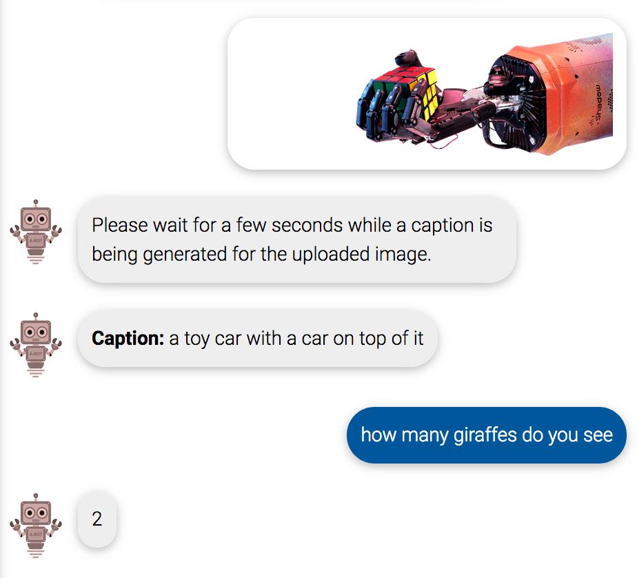 image: robot arm holding a rubiks cube<br />
caption: a toy car with a car on top of it<br />
me: how many giraffes are there<br />
bot: 2