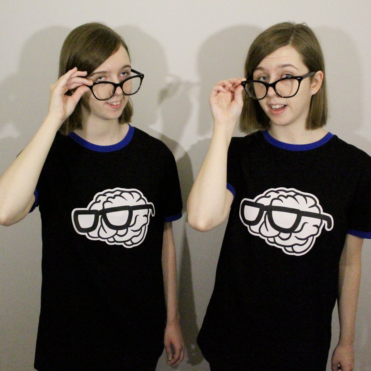 Ali_and_Macy's tweet photo. We treated ourselves to some Sanders Sides shirts and we absolutely love them! Thank you, @ThomasSanders! Of course, we had to get silly and have a lil photoshoot! We tried our best to channel each side, haha! ✨ https://t.co/BzMF6I2pcZ