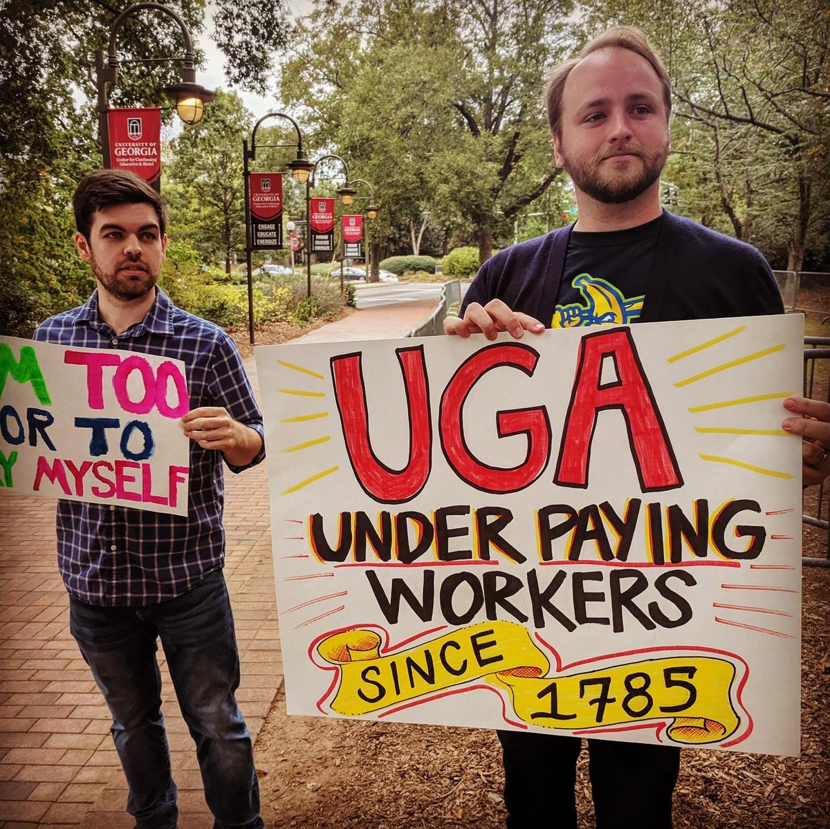 UCWGA3265's tweet photo. What’s outrageous? Georgia wages! UCWGA and community groups rallied at the Board of Regents meeting at UGA today. Join grad workers as they continue to fight the high cost of student fees. #livingwage #fairpay #athensga #ucwga #intolerablefee https://t.co/mBvirlYzUw