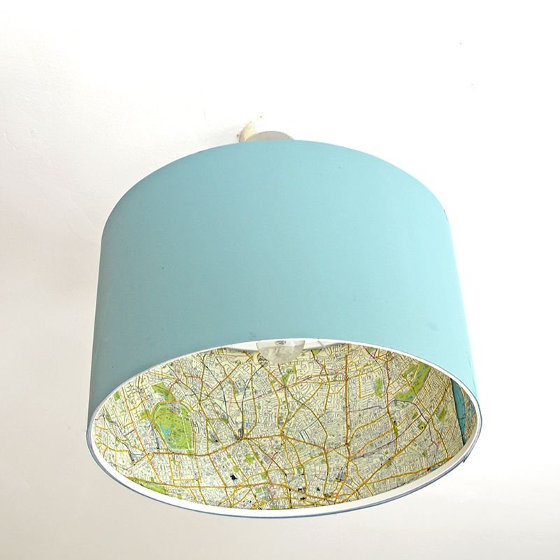 We love to add decor touches in the most unexpected places! This DIY will teach you how to attach a chic, vintage-map print to the inside of a lampshade: bit.ly/2snxPzT 📍🌎💡