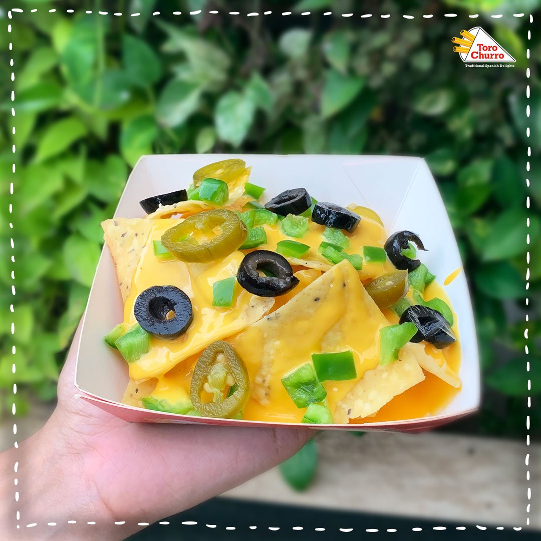 ToroChurro's tweet photo. This Navaratri should be full of Nacho! Nacho on the dance floor and Nacho in your tummies! So #LetsNacho this Navaratri with Toro Churro's newest addition - #Cheesylicious #Nachos! 

#FridayFeeling https://t.co/Lbk4OsX5yq