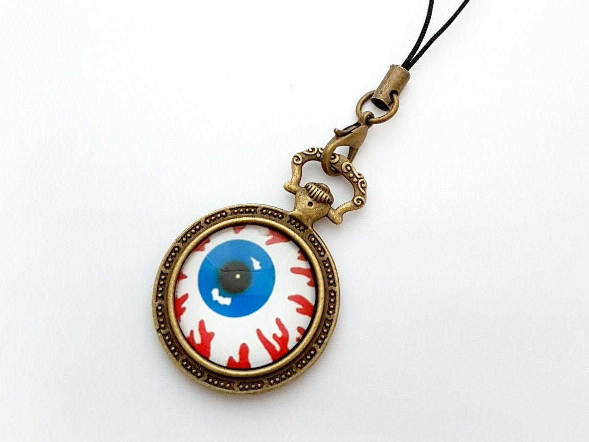 celdeconail's tweet photo. Halloween vibes mode on with a spooky eye charm that goes everywhere! #etsy #phonecharm #halloween #bagcharm #plannercharm https://t.co/bplx2UFWJ2 https://t.co/gyC7WAxRIx