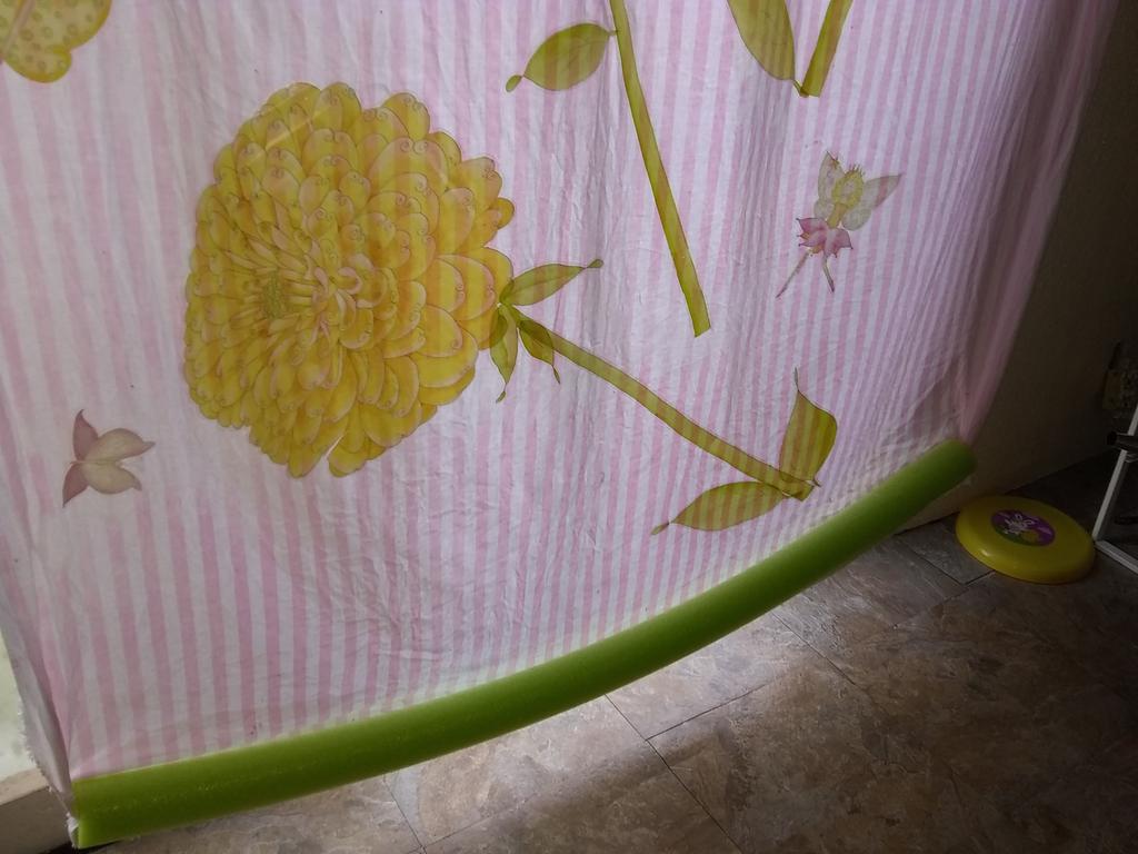 UnChat's tweet image. When I joined Twitter, I wanted to tweet about #design and #filmsetdesign. Back to basics...a .22 cent pool noodle, faded but new material, 2pet toys with too much string for pet toys @spcafl, and a used press on wall sticker set. My cat&apos;s window curtain. Hit the noodle guys!