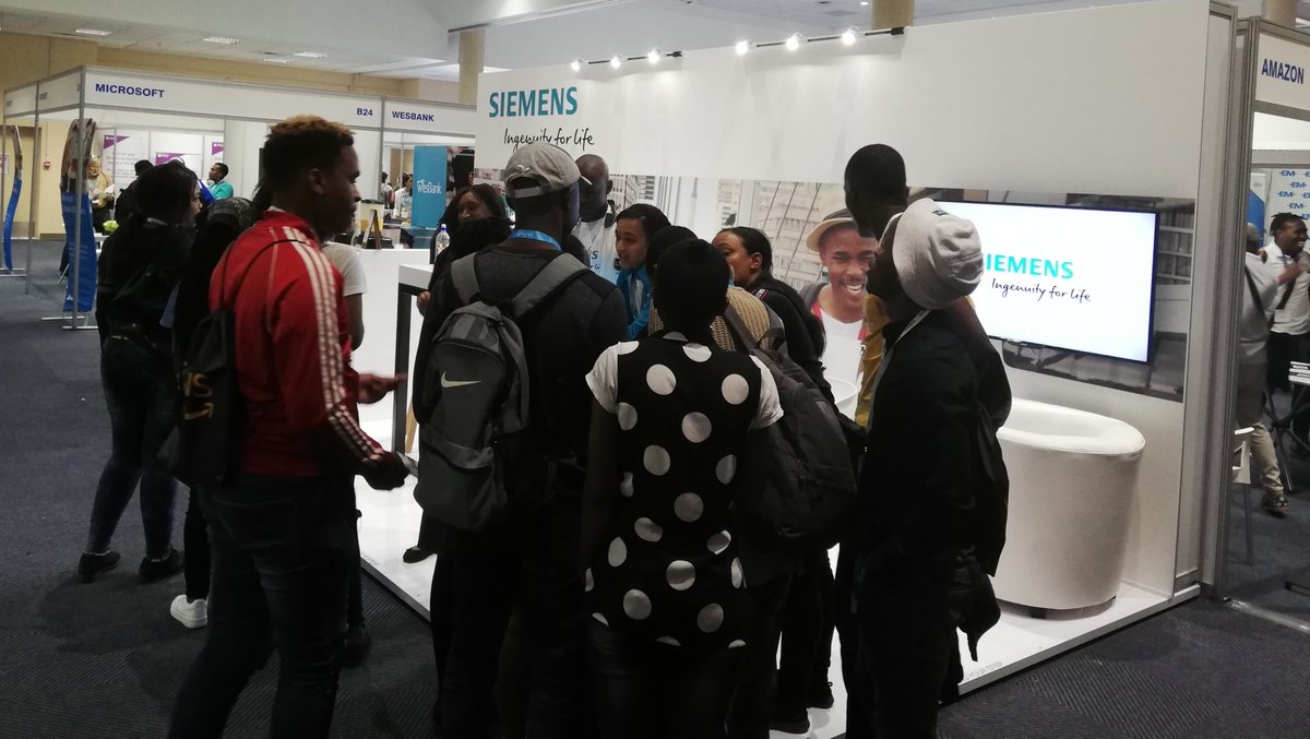 EngineerITNews's tweet photo. The @SiemensAfrica booth at the @STEM_CareerExpo is booming! Clearly many school students are interested in a future there. #education #STEM #Engineering https://t.co/nzezLOmrzk