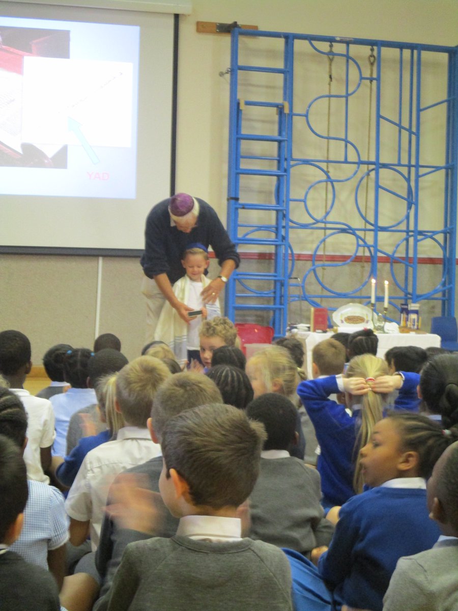 ststephenscps's tweet photo. To end Judaism Week we had a visit from Mr Lukeover who talked to us about his Jewish beliefs.  He shared many items and taught us all to say 'Shalom' which means 'peace'. #JudaismWeek #Reception #Year1 #Year2 https://t.co/wGDhdiE4jl