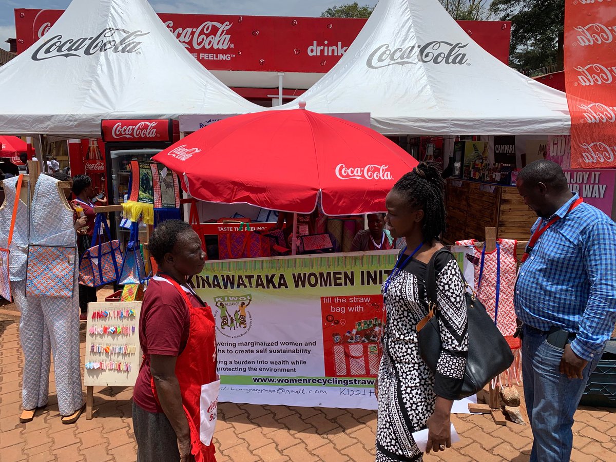 skaheru's tweet photo. Flavia Nabaasa (right) met Benedicta Nanyonga of Kinawataka Women’s Initiative, who makes various items out of used straws. #UGITF2019 @newsUMA https://t.co/x1eLU98APf