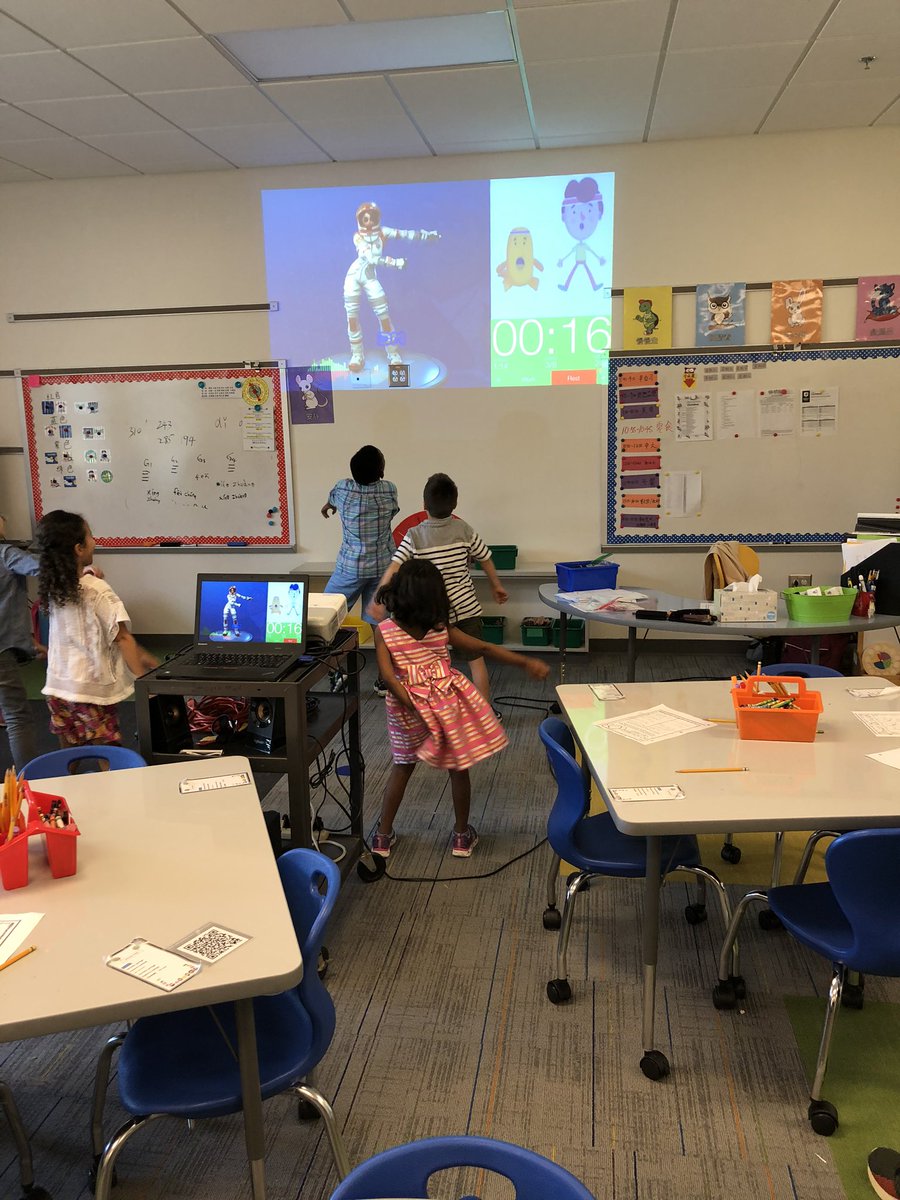 StoughPE's tweet photo. When the gym is being used for picture day, and it is 100 degrees outside, what do you do for PE?  Get active Fortnite Dancing in the classroom of course. Well, that’s what these @StoughStallions did. https://t.co/iNXRE0MJgT