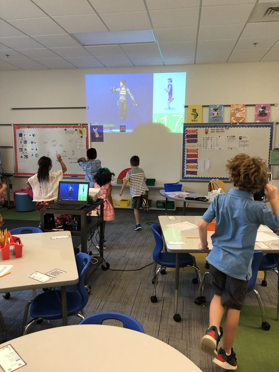 StoughPE's tweet photo. When the gym is being used for picture day, and it is 100 degrees outside, what do you do for PE?  Get active Fortnite Dancing in the classroom of course. Well, that’s what these @StoughStallions did. https://t.co/iNXRE0MJgT