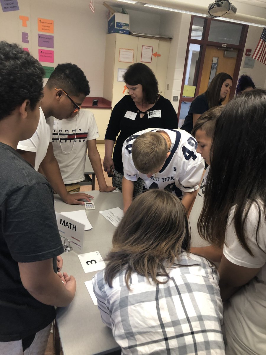 LearningKon's tweet photo. 8th grade STEM rotation uses math to calculate building a cube. #wypride https://t.co/VSfZDeQiJt
