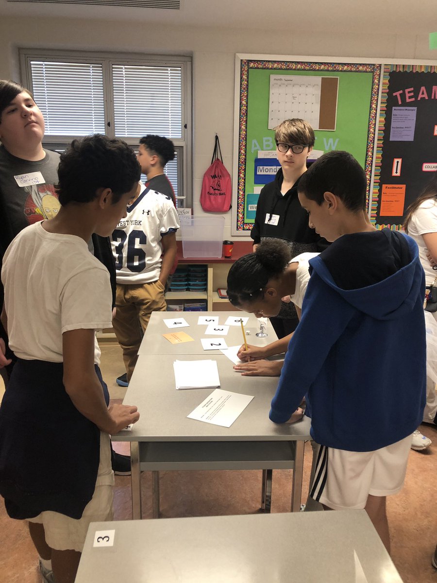 LearningKon's tweet photo. 8th grade STEM rotation uses math to calculate building a cube. #wypride https://t.co/VSfZDeQiJt