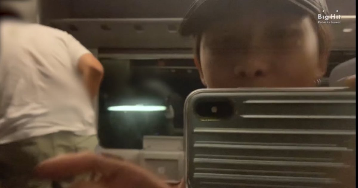 Our tour of Milan includes a baggage claim, a train, and the grandeur of Milan Central Station.