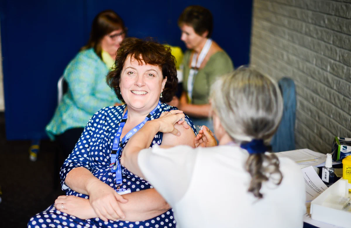 Devon Partnership Trust Chief Executive Melanie Walker gets her flu jab.