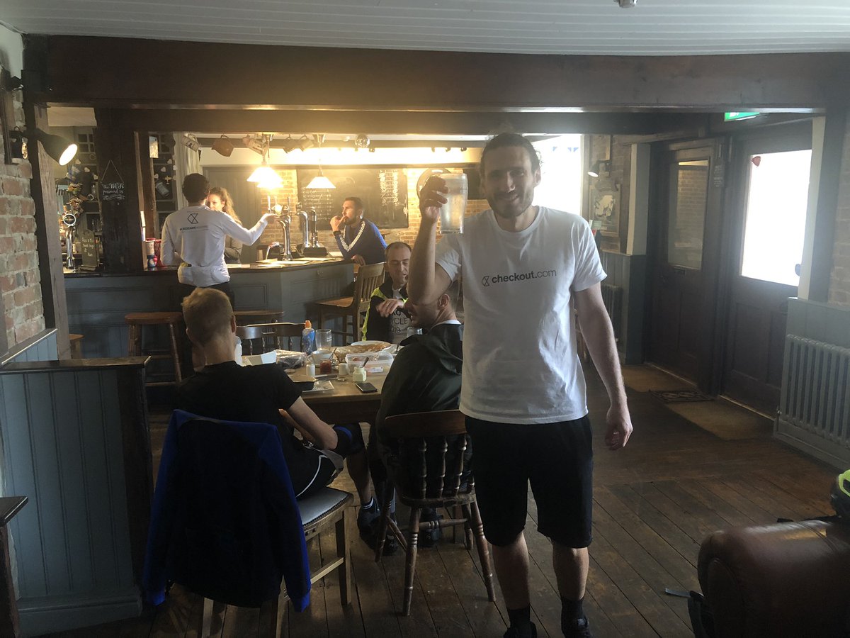 Checkout's tweet photo. Two thirds done, the guys are enjoying a well deserved lunch break. #cko #checkout #ckocares #cyclingprojects follow @CyclingProjects to find out why we’re doing this. https://t.co/5uNf8vn3bH