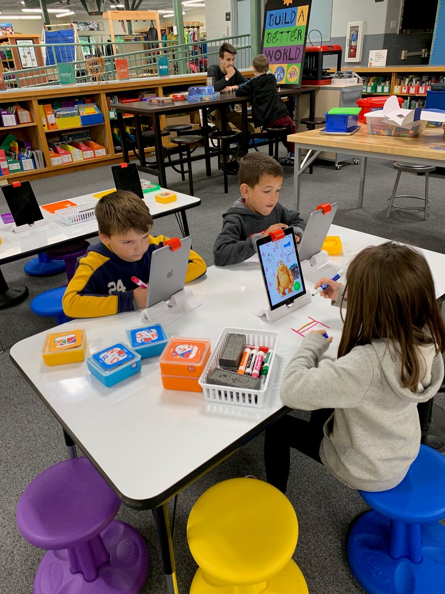 Our students using the Learning Commons area with choice time in media class.