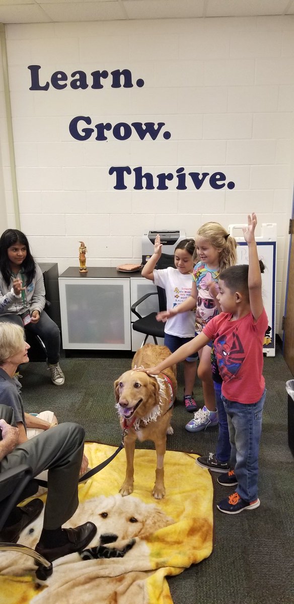 Educator_ASoto's tweet photo. Full &amp; Exciting day @ParkStEle. Annie came back to visit our lucky 1st grade Ss. #HappyTailsAtlanta &amp; #ReadingPAWS https://t.co/zyGw5yihi0