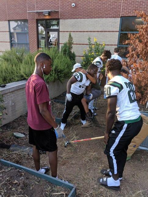 Our students came out today to help improve our garden for our school!! #schoollove #puttinginthatwork