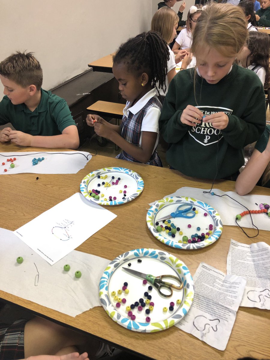 Strochschool's tweet photo. 3rd graders made rosaries today with the help from 6th grade. https://t.co/WmcfoHrBBy