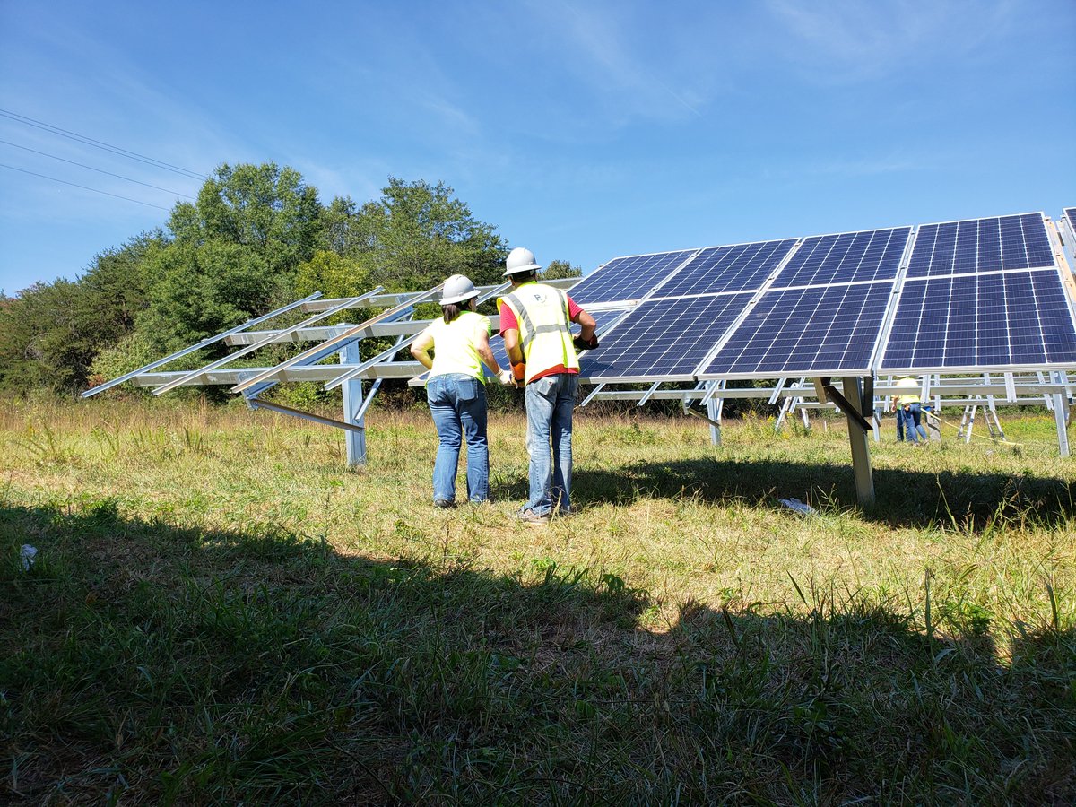pleide's tweet image. Happy #Friday from part of our ReNewPetra team, installing panels at our site in western #NorthCarolina. #solarenergy
