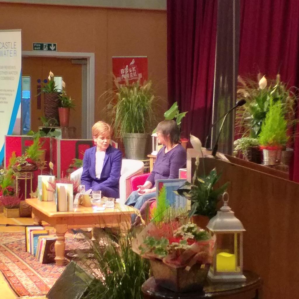 bookmarkblair's tweet photo. In a difficult time, it is "heartwarming and optimistic to be gathered in a school hall, about to talk about stories and books and writing" - and who better to do it with than with Ali Smith @NicolaSturgeon #Bookmark19 https://t.co/3yT0VDHcg3