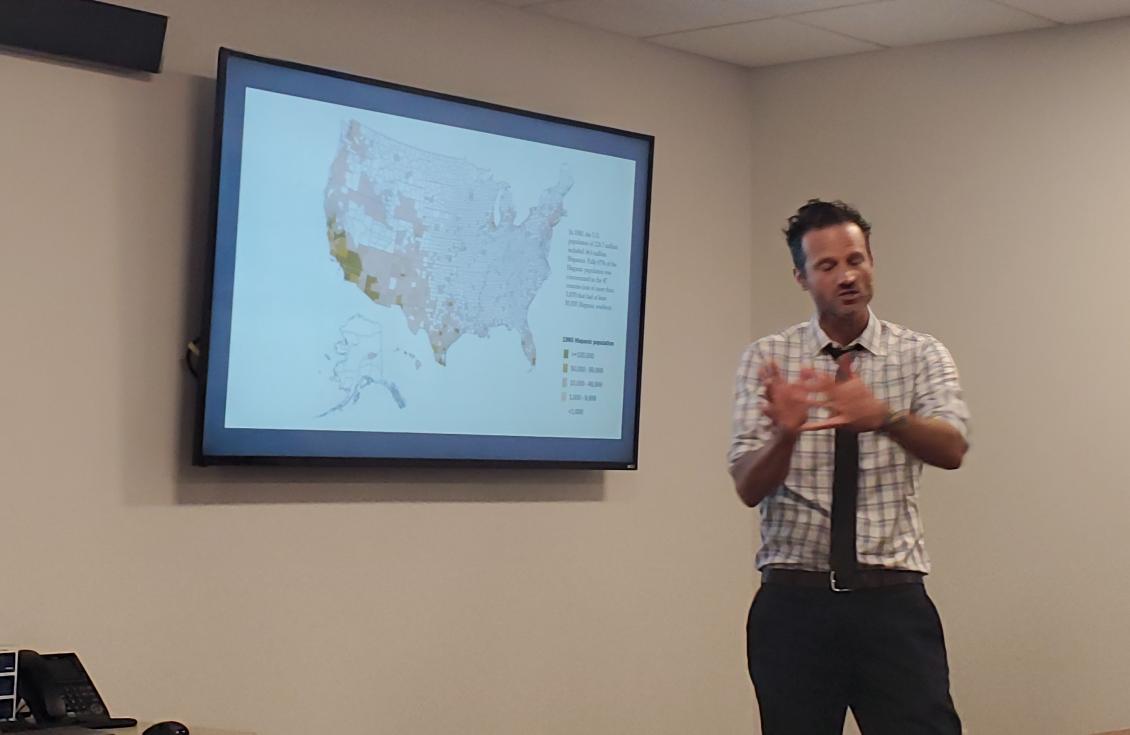 realMABarreto's tweet photo. First up at #UNMPRIEC @WeArePRIEC is Mike Rocca @UNM who wins for best and most animated hand gestures. Also his paper on Latino pop growth and the mixed relationship to congressional representation is SUPER INTERESTING https://t.co/niiRhKg2Cy