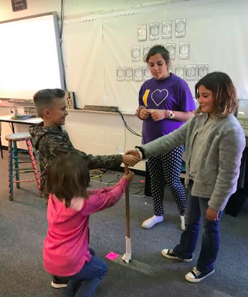 BlakePeck14's tweet photo. In the spirit of homecoming week🏈🖤❤️💛, 6th graders were challenged to make a goal post that could stand upright. Using 5 pieces of paper, 12inches of Tape, Scissors and a yardstick. 4th graders came in to judge and talk to the groups about their goal post. #IFACadetPride https://t.co/U9l34NrnBS