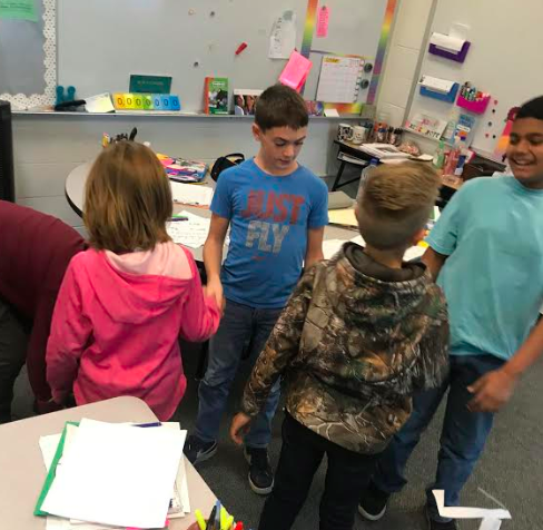 BlakePeck14's tweet photo. In the spirit of homecoming week🏈🖤❤️💛, 6th graders were challenged to make a goal post that could stand upright. Using 5 pieces of paper, 12inches of Tape, Scissors and a yardstick. 4th graders came in to judge and talk to the groups about their goal post. #IFACadetPride https://t.co/U9l34NrnBS