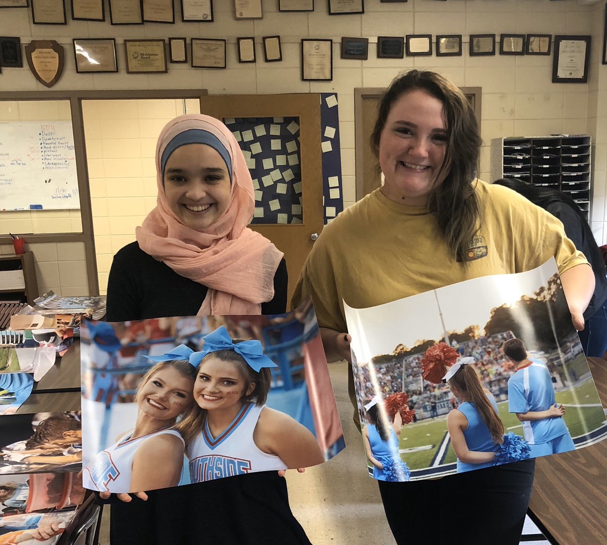Photographers Boushra Raache and Katy Sutton posing with their pictures to hang around the school. We’re so proud of all our photographers! #bemoremaverick
