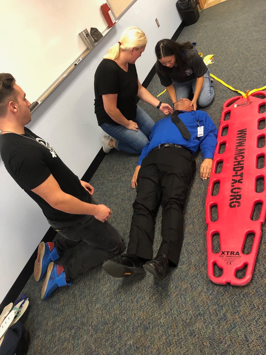 NewCaneyHS's tweet photo. Mr. Wologo volunteers to be a victim for the EMT students state skill testing. #ExpectExcellenceNCHS @newcaneyisd https://t.co/gox8Kins92