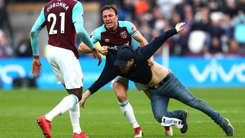#15Hard to fit this all in one tweet.We lost 3-0 at home to Burnley, Mark Noble threw a pitch invader to the floor, and another fan planted the corner flag in the centre circle whilst hundreds more angry fans confronted the board.Shambles.