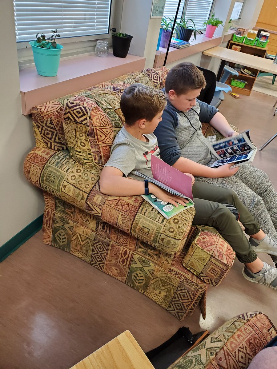 LearningwithMsG's tweet photo. These two boys have found a book series they love! Overheard them saying "Have you met this character yet?" and they're working together to more deeply understand their book. So proud! https://t.co/93Lgg6xzQK