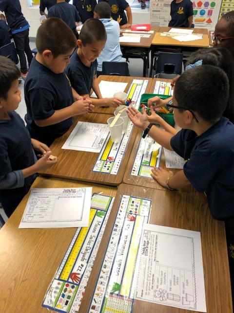 ECUEATigers's tweet photo. 1st Grade Leaders in Action...
Technology is using science to help solve problems. We had 4 cups, 4 large popsicle sticks, and 20 bears.
Goal: build a bridge that will fit all 20 bears at the same time.
#ECUEAFamily #ExtremeTeaching #DareToLEAD #STEM https://t.co/Ojc6Kn52di