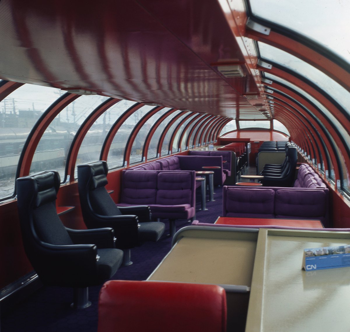 CNRailway's tweet image. Jet-setting never looked cooler than in our glossy-white, red-nosed TurboTrain, and the dome cars had the best seats in the house. Passengers could sit back, swivel and enjoy the view. #CN100