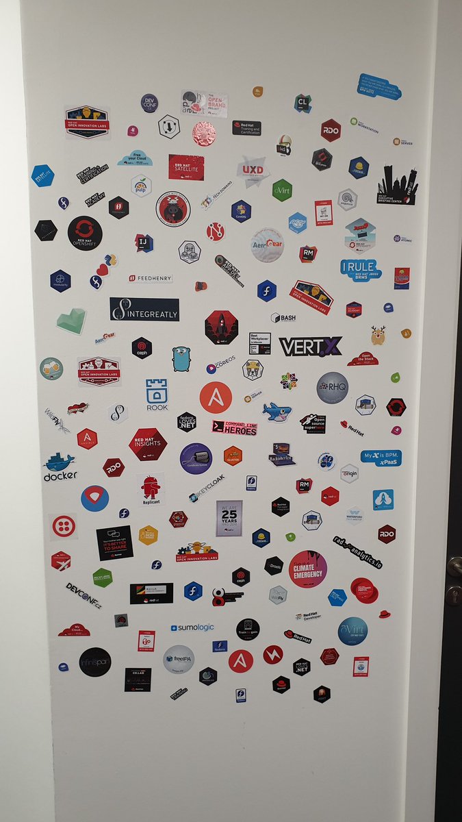 mernin's tweet image. We unveiled our new sticker wall at the #RedHat #Waterford office this week and it looks amazing @RedHatJobs #WeAreRedHat #CultureCorner